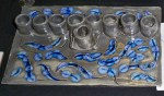 Antique Blue Alligator Glaze with two shades of blue glass beads melted into the carved sections.