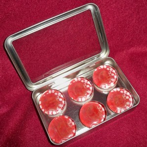 Six of the many magnets I created using glass marbles, diamond glaze, and ferrite magnets.