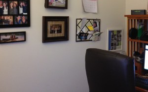 Photos of family and friends are on display to the left of my desk (in my home office).