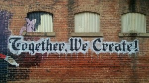 Graffiti: "Together, We Create!"
