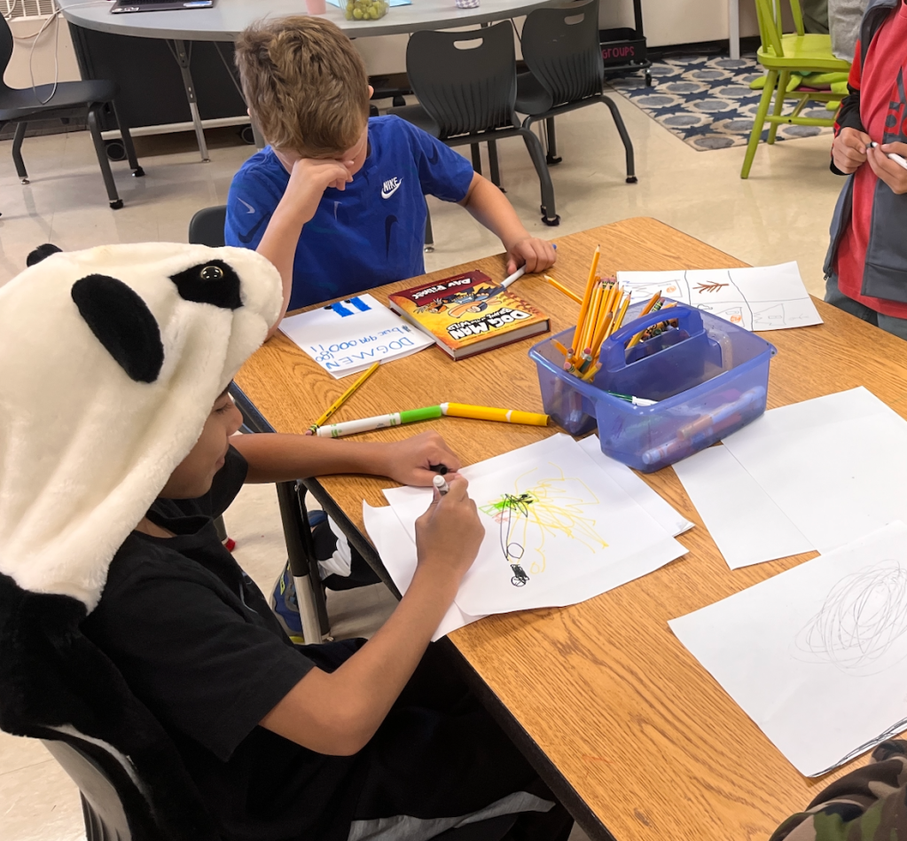 These first graders are co-authoring a graphic novel, drawing inspiration from mentor author Dav Pilkey's "Dog Man."