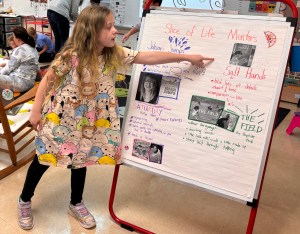 A second grade author points out the craft moves we identified in narrative mentor texts.