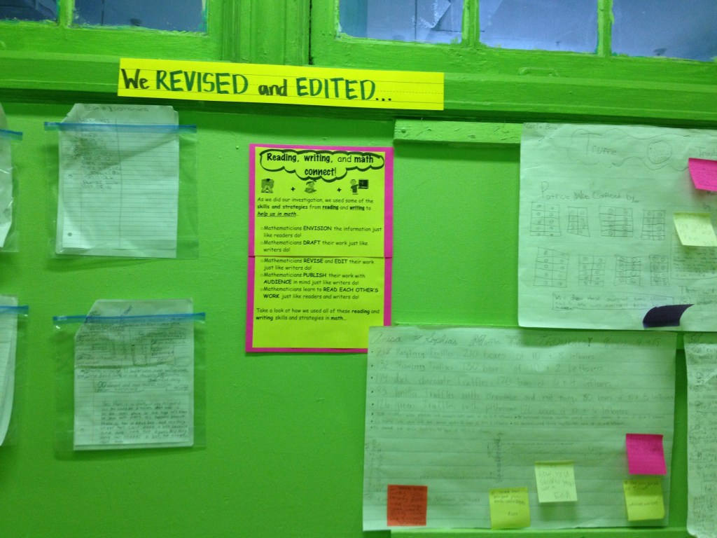 An image of a bulletin board displaying student work with the heading, "We revised and edited our work..."