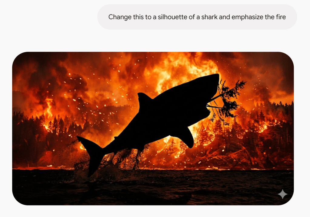 The black outline of a shark in front of a bright forest fire